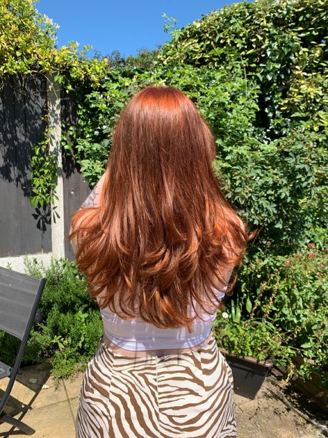 Picture of the back view of girls mid length hair. Has mid-copper hair shade with long choppy layers cut in. Long Layer Red Hair, Long Layers Copper Hair, Rihanna Copper Hair, Auburn Hair Long Layers, Layered Long Red Hair, Long Ginger Hair With Layers, Long Auburn Hair With Layers, Copper Layered Hair, Copper Hair With Layers