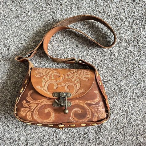 Beautiful Well Made Leather Shoulder Bag Hand Tooled Dragon Flower Brown Small Vintage Style New, Never Been Used Approximate Measurements Height 6in Width 9.5in Depth 4in Dragon Flower, Flower Brown, Hand Tools, High Boots, Leather Purses, Leather Shoulder Bag, Knee High, Shoulder Bags, Vintage Style