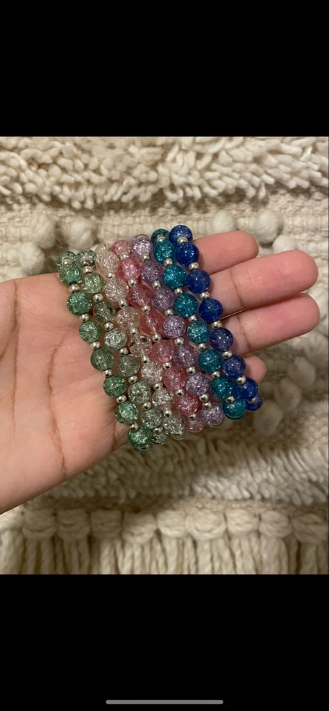 ✨These handmade bracelets are made out 8mm glass crackle beads, 4mm smooth silver beads,and stretch cord. ✨The bracelets are approximately 6.5 inches ✨Ships with 3-5 business days Bead Bracelet, Silver Beads, Handmade Bracelets, Making Out, Etsy App, Selling On Etsy, Sell On Etsy, Unique Gifts, Etsy Gift Card