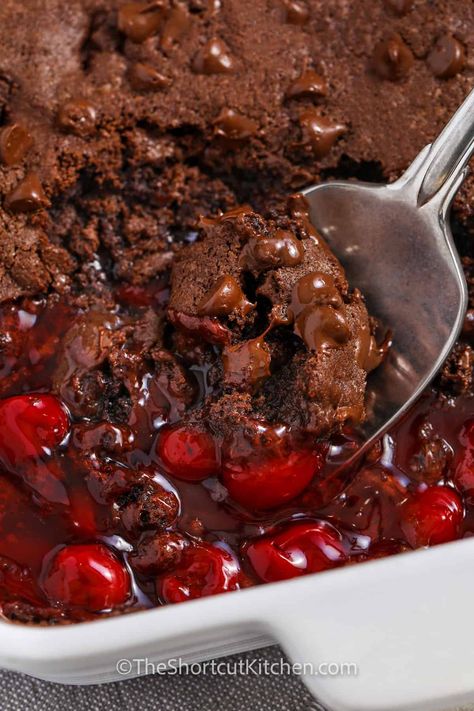 Treat yourself to chocolate cherry dump cake! This indulgent recipe blends Devil's Food cake mix, cherry pie filling, melted butter, and semisweet chocolate chips for a rich, gooey dessert. Simply layer the ingredients in a greased pan and bake. Enjoy warm with whipped cream or ice cream. Perfect for any celebration and sure to impress! #theshortcutkitchen Devils Food Cherry Dump Cake, Chocolate Cherry Dump Cake Recipes, Chocolate Cherry Dump Cake 3 Ingredients, Devil Food Cake Mix Recipes, Chocolate Cake With Cherry Pie Filling, Cherry Dump Cakes, Cherry Pie Filling Cake, Cake Mix Cherry Pie Filling, Chocolate Cherry Dump Cake