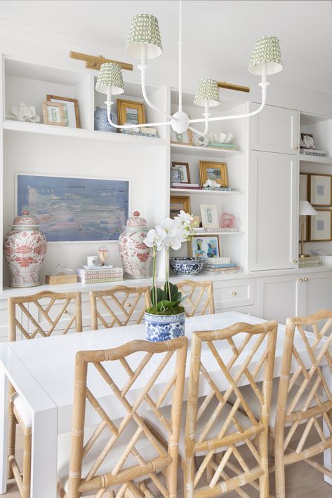 Coastal Transitional Decor, White Lacquer Desk, Coastal House Decor, Den Library, Lacquer Desk, Green Chandelier, Bamboo Chairs, Coastal Dining Room, Pretty Houses