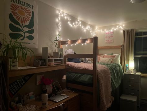 pink and green themed dorm room with twinkle lights and taylor swift inspired decor College Dorm Room Fairy Lights, Dorm Room Ideas Green And Pink, Green And Brown Dorm Room, Light Pink And Green Dorm Room, Pink And Sage Green Dorm, Green And Pink Dorm, Dorm Room Green, Green And Pink Dorm Room, Pink And Green Dorm Room