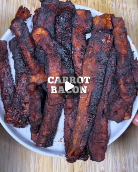 @veganrecipe_ideas on Instagram: ""GET The Complete Plant Based Cookbook - Over 200+ Delicious Vegan Recipes Including 30-day Meal Plans" =>> LINK IN BIO 🔗 @veganrecipe_ideas  1️⃣ or 2️⃣? What recipe do you like the most?  By @Jacobking  1️⃣ CARROT BACON 🥓 written recipe below👇🏾  A healthy, plant based alternative to an unhealthy and unethical meal 🤝  👇🏾INGREDIENTS👇🏾 -2 large carrots -large pinch of salt  -2 tbsp soy sauce -1 tbsp maple syrup -1 tsp garlic/onion powder each -1 tbsp tomato paste -1 tsp rice vinegar -pinch of black pepper  👇🏾METHOD👇🏾 -slice your carrots into thin strips, use a grater if possible. -place in a bowl then coat with salt and rub it in to make sure it’s all coated and leave for an hour to soften. -rinse of the salt using water then coat in the marinad Carrot Bacon Recipe, Carrot Bacon, Vegan Plan, Plantbased Recipes, Vegan Bacon, Plant Based Cookbook, Vegan Inspiration, Vegan Meal Plans, Vegan Meal Prep