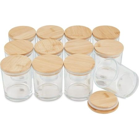 The Pavelle 8 oz. Round Glass Candle Jars with Bamboo Lids are a great way to add a touch of luxury to your home decor. These sleek candle jars with lids come in a pack of 12 and can be used as empty candle jars for making candles. They are also versatile enough to be used as storage containers for jewelry, gifts, candy, office supplies, and more. The candle making jars are easy to clean and sturdy enough to be moved around as needed. With so many uses, these glass jars for candle making are per Candle Jar Ideas, Candle Making At Home, Sweet Scented Candles, Candle Making Jars, Glass Candle Jars, Empty Candle Jars, Empty Candle, Safe Candles, Candle Making Wax