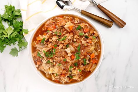 This Healthy Cabbage Soup is seriously delicious, super filling, and tastes just like a cabbage roll! Made with ground turkey and cauliflower rice, this freezer friendly dish is amazing! #dinner #lunch #soup #freezerfriendly #kidfriendly #makeahead #quickandeasy Weight Watchers Cabbage Soup, Healthy Cabbage Soup, Cabbage Soup Diet Plan, Soup Diet Plan, Cabbage Cauliflower, Meat Soup, Unstuffed Cabbage, Slender Kitchen, Lasagna Soup Recipe