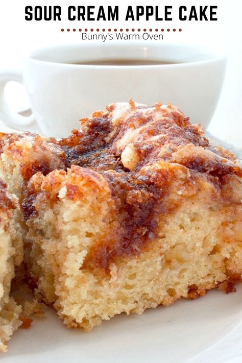 Sour Cream Apple Cake sitting on a white plate Apple Coffeecake Recipe, Mahjong Snacks, Sour Cream Apple Cake, Homemade Cream Cheese Recipe, Recipes Using Sour Cream, Sour Cream Desserts, Apple Coffee Cake, Apple Coffee, Coffee Cake Recipes Easy