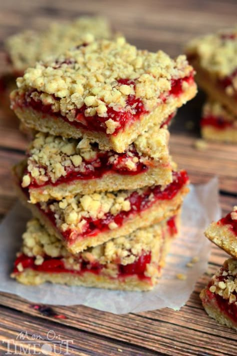 You're just four ingredients away from these delicious Cherry Oatmeal Crumble Bars! | MomOnTimeout.com Cherry Oatmeal Crumble Bars, Oatmeal Crumble Bars, Cherry Recipes Dessert, Cherry Oatmeal, Oatmeal Crumble, Recipes Using Cake Mix, Cherry Bars, Boxed Cake Mixes Recipes, Crumb Bars