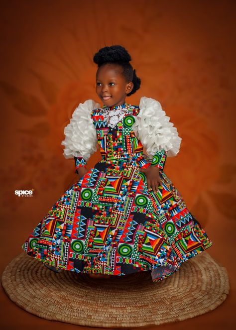 Ankara dress that is classy and suitable for birthday shoot Children Ankara Ball Gown Styles, Ankara Ball Gown Styles, Ankara Ball Gown, Ball Gown Styles, Christmas Gown, Tulle Gowns, Ankara Styles For Kids, Christmas Attire, Ankara Dress Styles