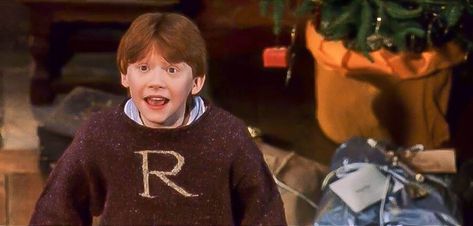 Harry Potter and the Sorcerer’s Stone - Ron - Hey Harry, presents! Ron Weasley Christmas Sweater, Fanfiction Recommendations, Harry Potter Sweater, Ron And Harry, Harry Potter Girl, Ronald Weasley, Harry Potter Ron, Fantasy Land, Rupert Grint