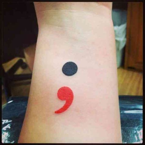 Semicolon tattoos come in various shapes, sizes, and colors while they all have different meanings. Find out what each colored semicolon tattoo means and what combinations of symbols, like arrows, a cross, and an anchor, mean if you decide to include them in your own special tattoo.  #tatoos #meaning #symbols #mentalhealth Tattoos Semicolon, Semicolon Wrist Tattoo, Semicolon Tattoo Meaning, Semicolon Tattoos, Unique Tattoos Black Women, Colon Tattoo, Semicolon Project, Tattoos Meaning, Semi Colon