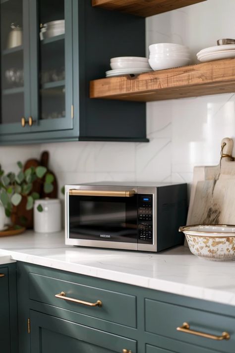 Transform your kitchen with these chic microwave shelf hacks designed for stylish, efficient living. From creative shelving solutions to space-saving designs, discover how you can maximize your cooking space while keeping it clutter-free. Perfect for small kitchens, these ideas blend aesthetics with functionality, helping you create a serene cooking environment. Learn clever ways to incorporate style and practicality into your decor while ensuring that your microwave has a dedicated spot. Your dream kitchen is just a few ideas away! Floating Shelf For Microwave, Microwave Floating Shelf, Replacing Over The Range Microwave With Hood, How To Hide A Microwave In The Kitchen, Under Cabinet Microwave Ideas, Microwave In Kitchen Where To Put, Hiding Microwave In Kitchen, Microwave Alternative, Microwave Placement Ideas