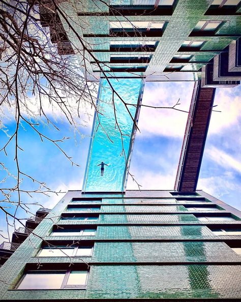 Residents can swim across 100-ft-high Sky Pool to neighboring high rise Sky Pool, London Neighborhoods, Awesome Architecture, Building A Pool, Lap Pool, High Rise Building, Red Walls, Apartment Garden, Garden Set