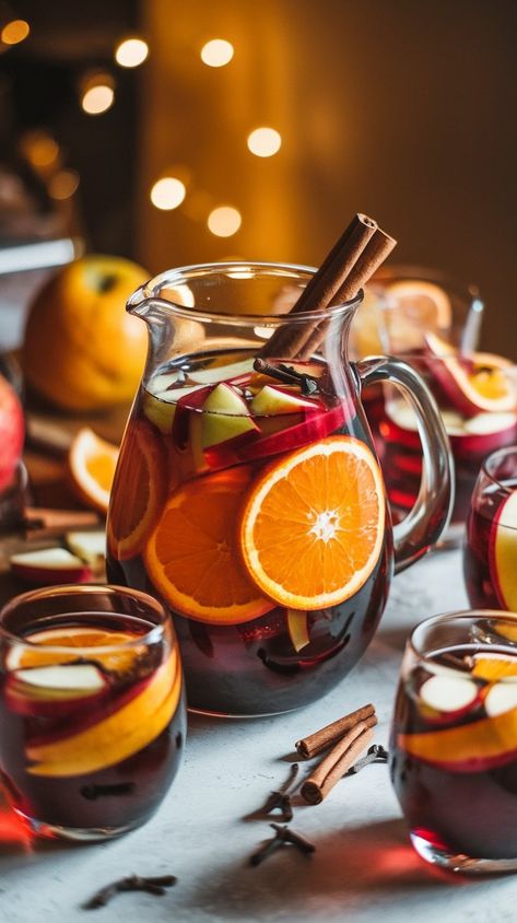 Mulled Wine Sangria Cocktail Recipe: Spice Up Your Winter Gatherings - Thirsty Tales Easy Fall Sangria, Winter Sangria Recipes, Fall Sangria Recipes, Easy Sangria Recipes, Winter Sangria, Spiced Cocktail, Sangria Cocktail, Wine Sangria, Mulling Spices