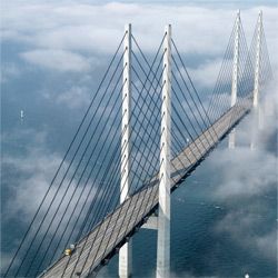 Oresund Bridge, connecting Denmark and Sweden (it is linked to an immersed tunnel and an artificial island comprising the Oresund Fixed Link) Sunshine Coast Australia, Denmark Travel, Bridge Building, Helsingborg, Malmo, The Mist, In The Clouds, Covered Bridges, A Bridge