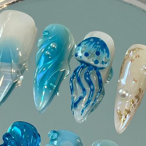 Sam | Press On Nail Artist ☆⋆｡𖦹°‧★ on Instagram: "Ocean themed freestyle set 🩵🏝️🪼🌼 . . . #pressonnails #oceannails #summernails #jellynails #longstilettonails #jellynails #flowernails #pearlnails #bluenails #waternails" 3d Ocean Nails, Sealife Nails, Ocean Theme Nails, Underwater Nails, Ocean Themed Nails, Jellyfish Nails, Nails Ocean, Ocean Nail Art, Pool Nails