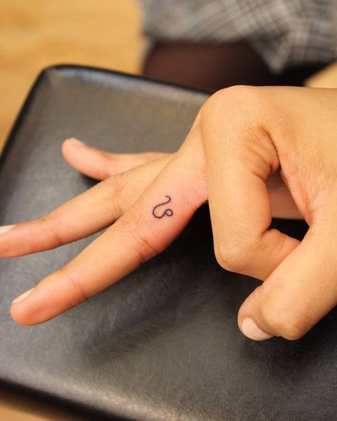 Leo Zodiac symbol on the middle finger. Small Leo Tattoo, Leo Zodiac Symbol, Leo Zodiac Tattoos, Leo Tattoo Designs, Leo Tattoo, Small Finger Tattoos, Finger Tattoo For Women, Leo Tattoos, 4 Tattoo