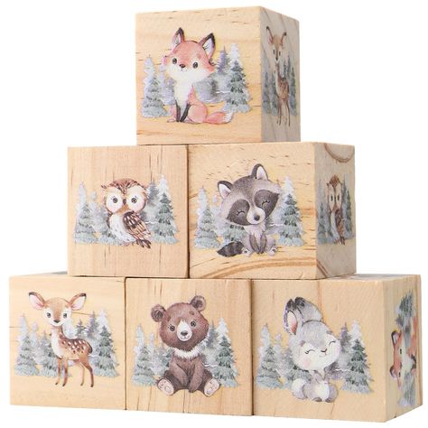 PRICES MAY VARY. These nursery decor includes 6 blocks with various themes. Each measures 1.6 inches. Material: This decors are made of premium wood, which are sturdy and long lasting. Cute Animial Design: Watercolor woodland animal theme, an adorable gift idea for nursery decor. Awesome Nursery Decor: You can place them in your bedroom, living room, nursery, kids' room, office, new wall shelf or baby shower table. Baby Shower Gift: These are perfect baby gift for a newborn boys or girls, as wel Nursery Decor Animal Theme, Forest Animals Nursery Theme, Woodland Animals Baby Shower Theme, Baby Name Signs For Nursery, Unisex Nursery Themes, Wooden Shelf Decor, Woodland Baby Shower Theme Decorations, Modern Woodland Nursery, Woodsy Nursery