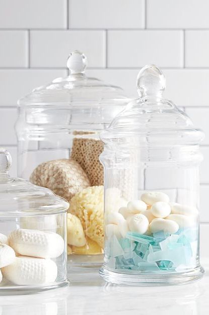 25 Bathroom Organizers Under $20 - Genius Bathroom Organization Ideas Dollar Store Bathroom Organization, Large Glass Canisters, Bath Beads, Glass Bathroom Accessories, Bathroom Jars, Bathroom Canisters, Walk In Shower Designs, Glass Apothecary Jars, Glass Canisters