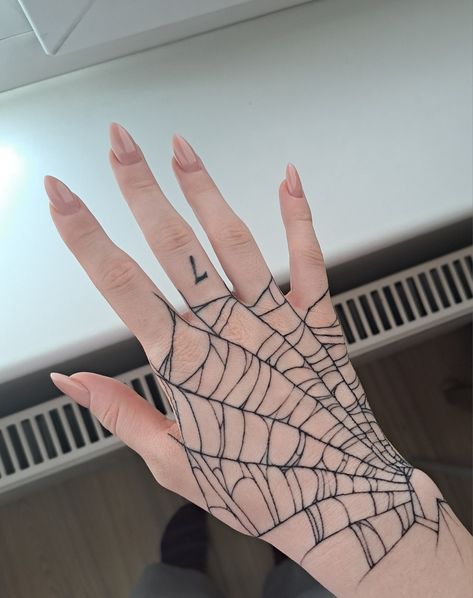 spider web tattoo Behind Ear Spider Web Tattoo, Hand Tattoo Spider Web, Hand Tattoos Spiderweb, Spider Web Hand Tattoos For Women, Cobweb Hand Tattoo, Hand Web Tattoo, Spider Web Arm Tattoo, Hand Spider Web Tattoo, Spider Web Wrist Tattoo