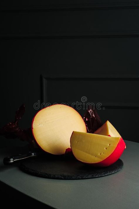 Sliced head of Edam cheese royalty free stock photo Edam Cheese, Dark Background, Free Stock Photos, Royalty Free Stock Photos, Royalty, Royalty Free, Stock Images, Cheese, Stock Photos