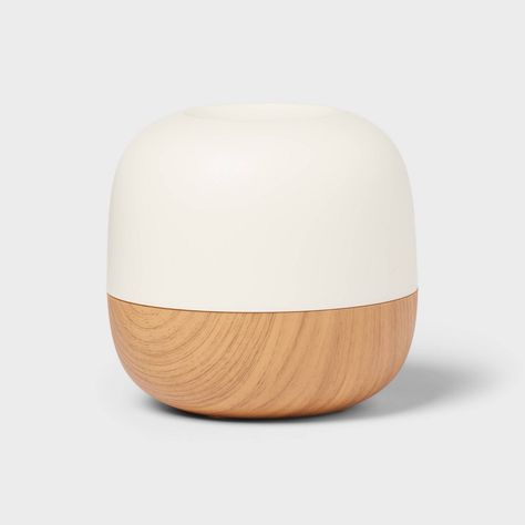 Set up your space for unwinding with the Small Woodgrain Essential Oil Diffuser from Threshold™. This stylish electric diffuser uses ultrasonic vibration humidification technology to diffuse your favorite aroma with or without mist, as you like it. Whether unwinding after a long day or creating a calming ambiance for a cozy night, this essential oil diffuser lets you create an atmosphere of pure peace. Threshold™: Looks like home, feels like you. Home Scent Diffuser, Room Things To Buy, Target Room Decor, College Apartment Needs, Humidifier Aesthetic, Cute Humidifier, Electric Diffuser, Coastal Room Decor, College Dorm Room Inspiration