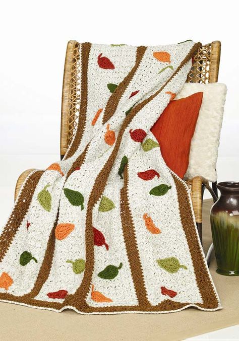 Crochet a beautiful afghan for autumn with colorful falling leaves. This intermediate afghan crochet pattern is worked from side to side beginning at right hand edge. Thanksgiving Crochet, Falling Leaf, Crochet Leaf Patterns, Fall Crochet Patterns, Fall Crochet, Crochet Afghan Patterns Free, Crocheted Blanket, Crochet Afgans, Crochet Blanket Afghan