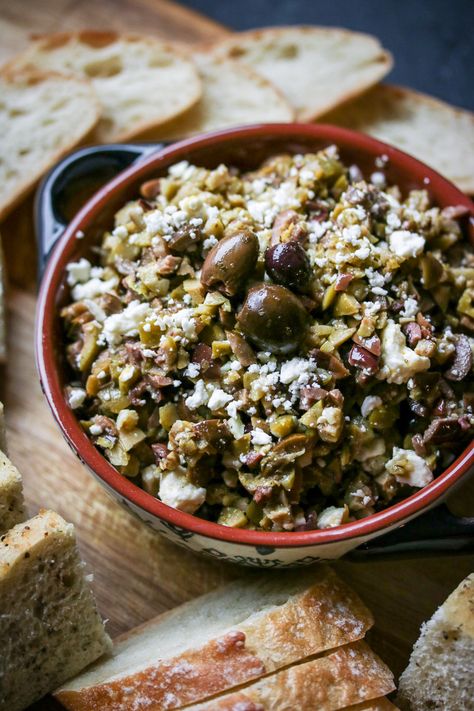 This chunky olive tapenade is flavored with lemon-infused olive oil and tangy feta- a memorable party appetizer! Olive Tapenade Recipe, Tapenade Olive, Olive Dip, Tapenade Recipe, Olive Tapenade, Wine Food Pairing, Party Appetizer, Tapenade, Appetizers For Party