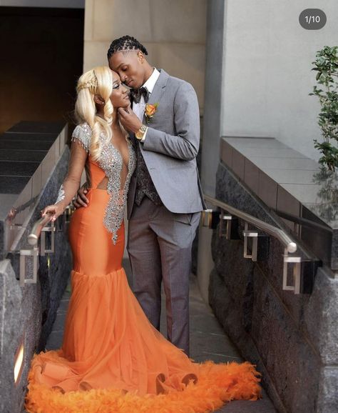 Orange And Grey Prom Couple, Burnt Orange Prom Dress Black Couple, Orange Prom Dress With Date, Prom Couples Black People, Prom Colors For Couples, Prom Dates Couples, Prom Black Couples, Prom Dress Couple, Prom Suit And Dress