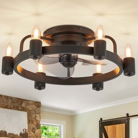 This modern farmhouse ceiling fan with a unique candlestick light design that adds a touch of vintage charm to any space. Vintage Ceiling Fans, Farmhouse Candle, Caged Ceiling Fan, Candle Design, Farmhouse Ceiling Fan, Farmhouse Candles, Peaceful Environment, Chandelier Fan, Bedroom Light Fixtures