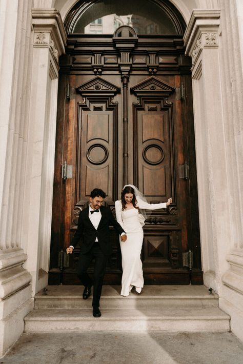 couple running out of City Hall in New York city after their elopement ceremony. Eloping In New York City, New York City Courthouse Wedding, City Hall Wedding Photos Nyc, Elope New York, City Hall Wedding New York, Wedding Photos City Hall, New York Elopement Photography, Nyc Wedding Dress, Courtroom Wedding Photography