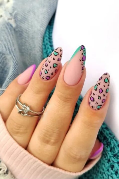 Most women love leopard or Cheetah print nail designs so much that they often go to nail salons to have their nails done in these popular dotted designs. If you are looking for some Leopard print nail inspiration, We have rounded up 37 fantastic #leopard_print_nails to try in 2023. stay here! Coral Animal Print Nails, Acrylic Nail Designs Leopard Print, Pastel Leopard Print Nails, Nude Animal Print Nails, Leopard Nails Summer, Leopard Print Summer Nails, Colorful Leopard Nails, Summer Europe Nails, Colorful Cheetah Print Nails