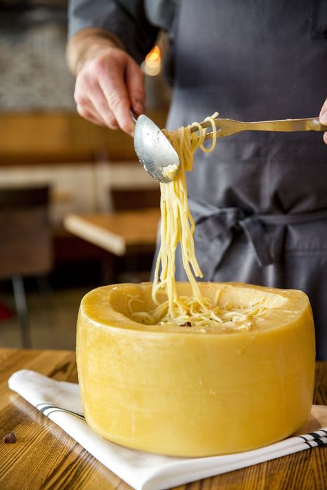 We’ve probably all seen the trend in videos from diners out in NYC, LA, Paris, and Rome. But what if we told you that you can find that viral, trendy, cheese wheel-tossed-pasta right here in Columbus, OH? Pelino’s Pasta uses a 60lb wheel of Pecorino Romana that’s been imported straight from Lazio, Italy to toss... Pasta Cheese Wheel, Parmesan Wheel Pasta, Roman Noodles, Cheese Wheel Pasta, Italy Pasta, Noodle Restaurant, Cheese Wheel, Lazio Italy, Pecorino Cheese