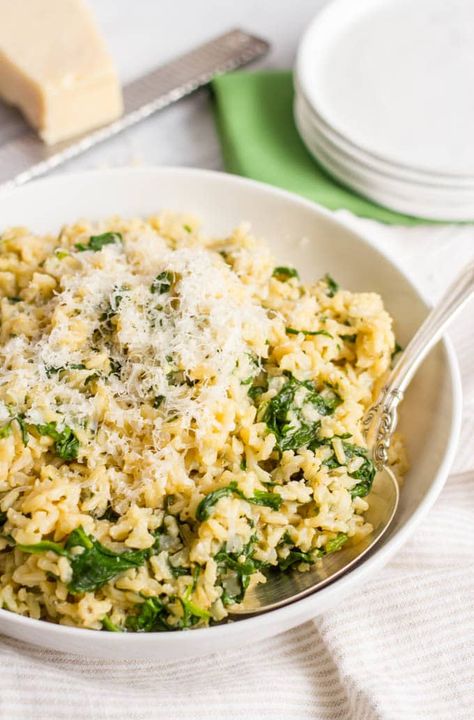 Brown rice with spinach and Parmesan cheese - Family Food on the Table Brown Rice Side Dish, Brown Rice Dishes, Rice With Spinach, Rice Recipes Side, Parmesan Rice, Healthy Rice Recipes, Recipes With Parmesan Cheese, Rice Side Dish Recipes, Healthy Rice