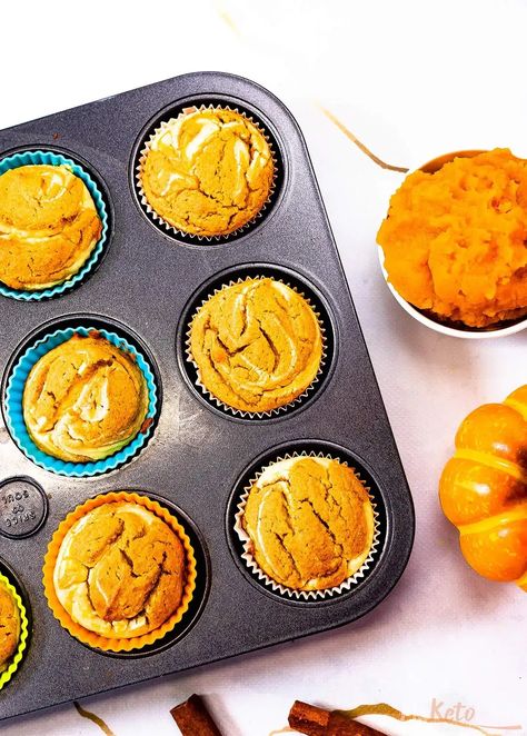 Ready in under 30 minutes and made with a few low-carb ingredients, these keto pumpkin cream cheese muffins are super easy to make and can be the perfect sweet treat for this holiday season. Keto Pumpkin Cream Cheese Muffins, Keto Pumpkin Cream Cheese, Pumpkin Recipes Keto, Keto Pumpkin Cheesecake, Pumpkin Cheesecake Muffins, Cheesecake Muffins, Pumpkin Cream Cheese Muffins, Pumpkin Cream Cheese, Sugar Free Treats