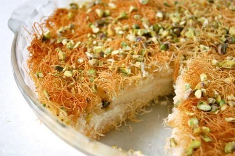 A Middle-Eastern favorite and a month of Ramadan tradition. This variation of Konafa is made from crunchy shredded phyllo pastry, sandwiching a creamy, pudding-like filling, and soaked with vanilla scented simple syrup. Ingredients: For the Vanilla Scented Simple Syrup: 2 cups granulated sugar 1 cup water Squeeze of lemon ½ teaspoon vanilla extract For the ... Kunafa Recipe, Arabic Sweets Recipes, Lebanese Desserts, Ramadan Desserts, حلويات عربية, Middle East Food, Arabic Dessert, Middle Eastern Desserts, Egyptian Food