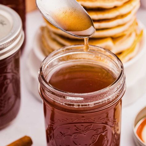 This apple syrup recipe transforms kitchen scraps into a sweet and flavorful syrup perfect for drizzling on pancakes, waffles, or ice cream. Apple Cinnamon Syrup Recipe, Canning Fruit Syrup, Peach Scrap Syrup, Apple Scrap Syrup, Apple Scraps Recipes, Canning Apples Recipes, Apple Syrup Recipe, Preserving Apples, Apple Syrup