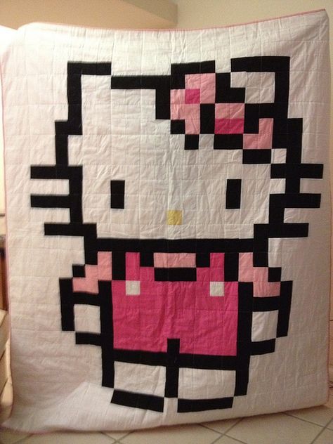 Hello Kitty quilt--would make a cute baby quilt or first bed quilt for a girl.  I'd have to make the pattern, but pick makes it super easy to count blocks.  ;) Kitty Quilt Pattern, Hello Kitty Quilt, Quilt Pattern Ideas, Kitty Quilt, Pixel Quilting, Hello Kitty Crafts, Bed Quilt, Childrens Quilts, Diy Quilt