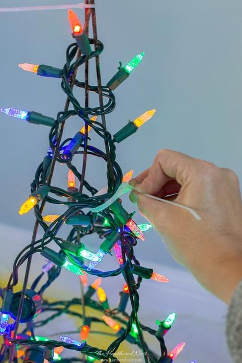 how to make a quick and easy snowy DIY tomato cage Christmas tree decor craft Christmas Tree Tomato Cage Easy Diy, Tomato Cage Christmas Tree Outdoor, Tomatoe Cage Christmas Trees, Christmas Tomato Cage Ideas, Tomato Cage Christmas Decorations, Diy Tomato Cage Christmas Tree, Tomato Cage Christmas Trees, Tomato Cage Tree, Diy Tomato Cage