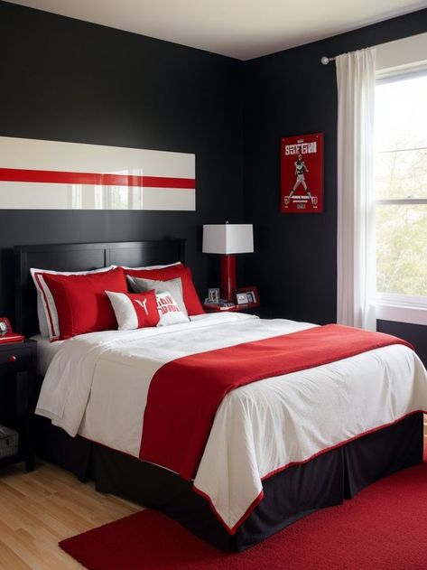 Create a bold boys bedroom with an eye-catching red accent wall. Pair it with a sleek black bed frame and incorporate sports-themed decor for a dynamic and energetic vibe. Black And Red Boys Bedroom, Ninja Bedroom, Black And White Boys Room, Guy Bedroom, Red Boys Bedroom, Boy Room Red, Red Accent Wall, Red Bedroom Decor, Blue Gray Bedroom