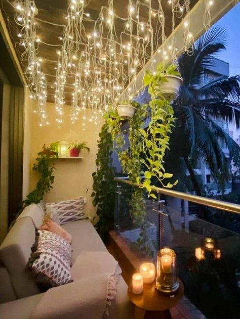 Apartment balconies are a small space with huge potential. Here are a few apartment balcony decor ideas to spruce up your outdoor space. Small Balcony Hanging Lights, Huge Balcony Ideas, Tiny Balcony Design, Unique Apartment Ideas, Private Balcony Ideas, Zen Balcony Ideas, Balcony Lighting Ideas, Zen Balcony, Balcony Hanging Plants