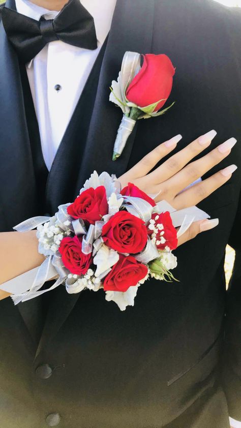 Red Flower Corsage Prom, Red Black And White Corsage Prom, Prom Corsage Red Dress, Red Boutonniere Prom, Corsage Prom Red Dress, Red Flowers For Prom, Red Corsages For Prom, Prom Wrist Corsage Ideas For Red Dress, Red Wrist Corsage Prom