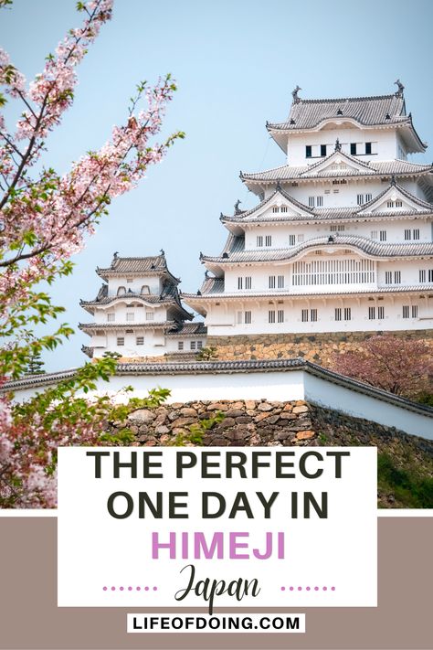 A white multi-level Himeji Castle surrounded by cherry blossoms and a stone wall at Himeji, Japan Kyoto Day Trip, Castle Gardens, Himeji Castle, Japan Itinerary, Train Route, Tokyo Station, Japan Travel Tips, Trip Itinerary, The Perfect Day