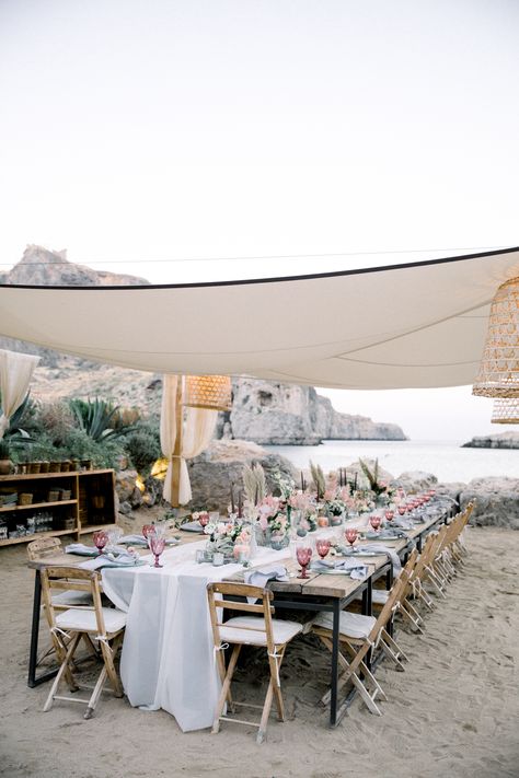 Read More: https://www.stylemepretty.com/2019/01/07/an-elegant-bohemian-wedding-on-the-beach-at-tambakio-in-greece/ Tambakio Restaurant, Restaurant Elopement, Greece Elopement, Beach Wedding Decorations Reception, Wedding On The Beach, Elopement Reception, Intimate Wedding Reception, Greece Photography, Elegant Bohemian