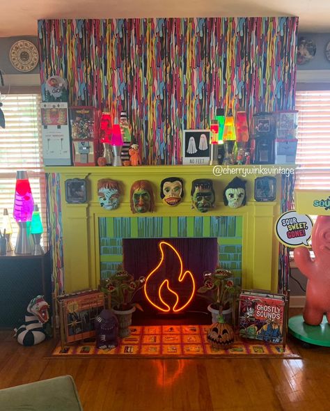 CherryWinksVintageCo🍒 | New fireplace. I.FREAKING.LUVVV.ITTT! 💜💚🔥 And that’s Milo being a good boi 🐶 . .. … #maximalist #maximalism #mantledecor #lavalamps… | Instagram Maximalist Tv Wall, Maximalist Fireplace, Maximalist Apartment, Rainbow Goth, Cozy Maximalism, Living Room College, Colorful Maximalist, Maximalist Interior, Ceiling Texture