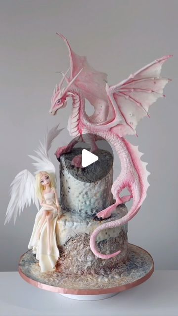 Dionis Iarovoi on Instagram: "Guardians of the sky! People always ask me, what do you like to sculpt the most? Dragons, angels, whatever has wings. One day of work and everything is ready! #cakeschool #cakeart #cakedesign #dragons #angels #loveart #fondant #modelling #sugarart #madewithlove #mystyle #cake #cakedesign #cakedecorating" Unicorn And Dragon Cake, Fondant Dragon, Fondant Modelling, Fondant People, Dragon Cakes, Fondant Figures Tutorial, Sky People, Dragon Cake, Sculpting Tutorials