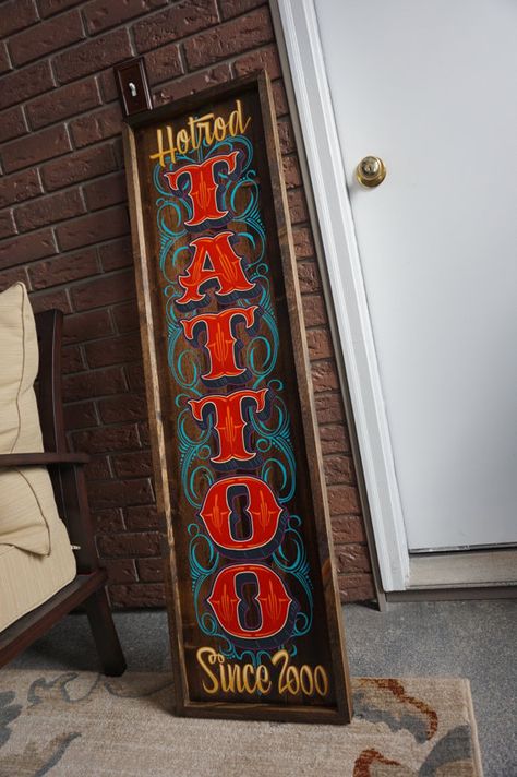 One of a kind Artwork TATTOO, sign hand painted in the good old US of A by… Pirate Tattoo Parlor Sign, Handpainted Shop Signs, Vintage Sign Painting Lettering, Tavern Signs Vintage, Vintage Handpainted Sign, Tattoo Shop Interior, Tattoo Shop Decor, Tattoo Studio Interior, Tattoo Salon