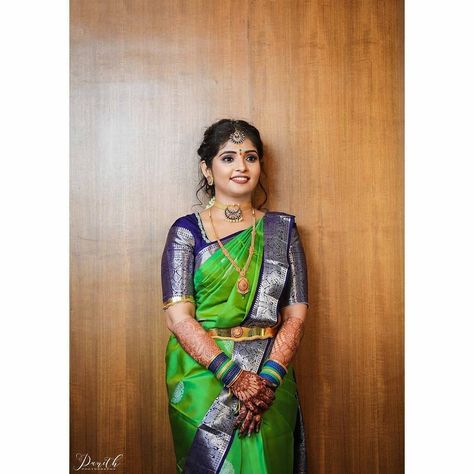 Green  #kanchipuram  #silk #saree in navy blue silver zari  border from  manufacturer at kanjivaram silks.  🛒 Click the link to see prices  designs :  https://kanjivaramsilks.com/kanchipuram-silk-sarees/  we make wedding sarees in your design and colour.  📱 WhatsApp: 9677063537  Fabric: Pure kanchipuram silk  Zari :  1 gram gold zari   Shop address: Kanchipuram silk sarees store, 251/9 Gandhi road, next to petrol bunk, Kanchipuram 631501.  #kanchipuramsarees   #kanchipuramsilksarees #silksare Green Blue Silk Saree, Green And Blue Saree, Green Kanchipuram Silk Saree, Plain Blouse Designs, Indian Bride Saree, Navy Blue Saree, South Indian Bride Saree, Blue Blouse Designs, Bride Saree