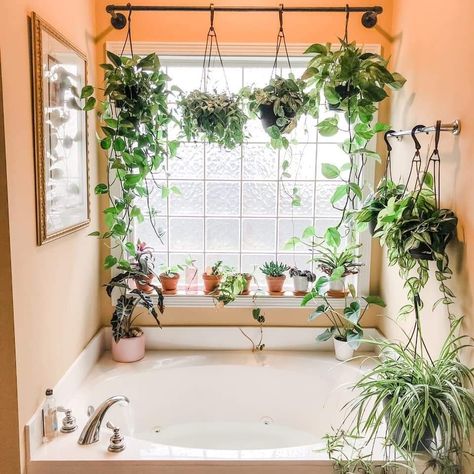 Plant Bathroom Aesthetic Modern, Plants Over Bathtub, Plants Above Bathtub, Bathroom Plants Aesthetic, Bath Next To Window, Bathroom With Lots Of Plants, Planty Bathroom Ideas, Plants Around Bathtub, Plant Aesthetic Bathroom