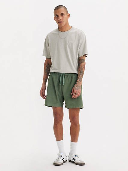 We took our XX Chinos and reinvented them as a pair of modern, roomy shorts. These XX Chino Easy Shorts feature an elasticized waist and keep you casually put together without looking like you tried too hard. A pair of modern, relaxed shorts Cut with extra room in the seat and thigh With an elasticized waistband and external drawstring Crafted with a blend of cotton and nylon Features a 6-inch inseam Shorts Outfit Ideas Men, Shorts Men’s Outfits, Green Shorts Outfit Men, Men’s Shorts, Uniqlo Men Outfit, Shorts Outfits Men, Wardrobe Reset, Green Shorts Outfit, Shoes With Shorts