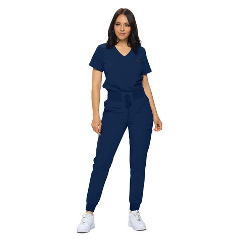 PRICES MAY VARY. PETITE AND REGULAR SIZING- Fit is important, go with Monarch scrub sets for the size that fits YOU. Refer to our size chart for the perfect fit scrubs! PREMIUM STRETCH- Our Poly/Spandex blend scrub set is crafted from a high-quality blend of stretch fabric, ensuring durability, flexibility, and all-day comfort. TUCK-IN SCRUB TOP- Keep it simple and clean with this one pocket tuckable top for a modern, professional look. MODERN RELAXED FIT JOGGER PANTS- Featuring a soft-ribbed wa Jogger Scrubs, Fit Scrubs, Navy Blue Scrubs, Pink Scrubs, Scrubs Uniform, Blue Scrubs, Safety Clothing, Fitted Joggers, Womens Scrubs